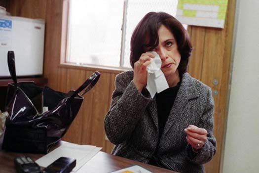 Devorah Halberstam wipes away tears as she talks about her son Ari, who died after being shot and killed by Rashid Baz.