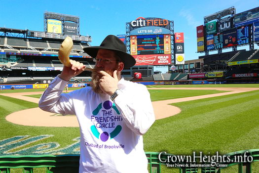 Rabbi Mendy Heber blows Shofar at Citi Field.