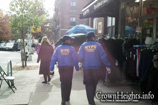 Police Officers from the Community Affairs Unit on Kingston Avenue Friday.