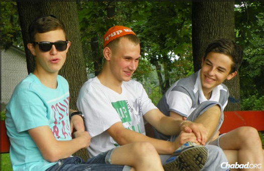 Teens taking a break. For some, Lugansk cannot fade into the background because family members remain there, unable to leave.
