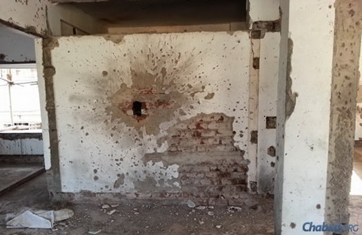 Following the attack the building was little more than a bullet-ridden shell.
