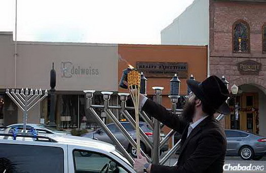 The first-ever public menorah-lighting in Prescott—and perhaps the first-ever car menorah, too.