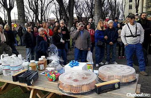 The Chanukah event drew about 100 people, not to mention passersby who stopped to take in the goings-on.