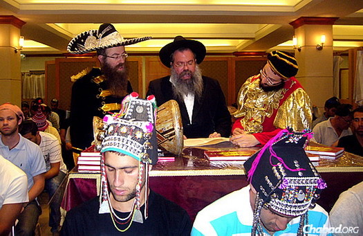 Headgear galore marked Purim 2014 at Ohr Menachem Chabad of Bangkok.
