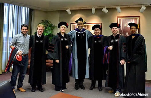 From left, Benjamin Cohen-Kurzrock, Chuck Hooten, LaDelle Davenport, University of Houston Law Center dean Leonard M. Baynes, Hutchinson, Michael Ryan and associate dean of student affairs Sondra Tennessee.