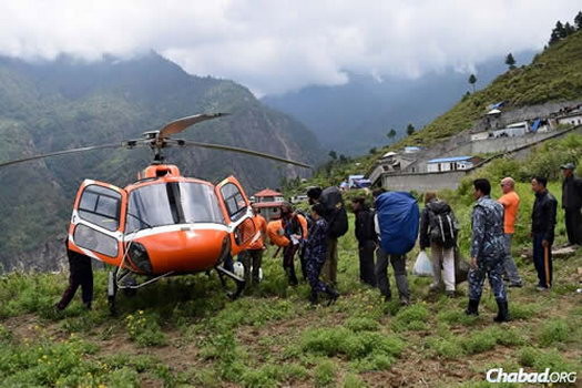 Rabbi Chezky Lifshitz has been flying via helicopter all over Nepal in search of both the living, who may still be stranded in far-flung places, and the dead, so their remains will be handled properly.