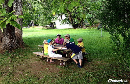 Enjoying some down time at a picnic bench on the grounds.