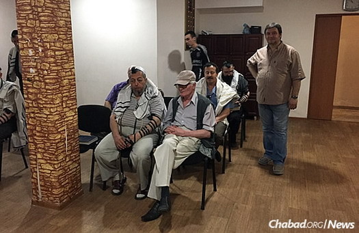 Congregants in the synagogue. Gopin says “people were also happy to see me because if I was able to return, even if just for a short visit, it already means things are getting a little better.”