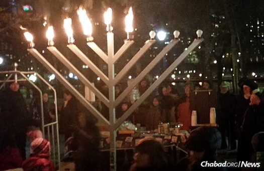 A public menorah-lighting on the island, where all are welcome to attend.