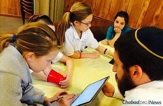 Hebrew-school students review their reading using cutting-edge computer programs and apps.