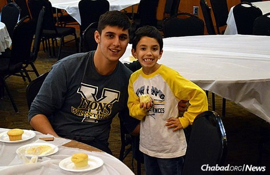 The Friendship Circle of Atlanta began in December 2011, and has grown by leaps and bounds in just a few years. Here, volunteer Niv Karevsky spends time with his special friend Jack Becker.