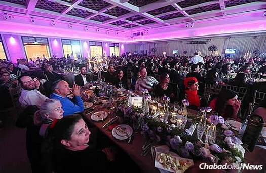 Community members and visitors attended at a Friends of Chabad dinner, held in part to help raise funds for the new building.