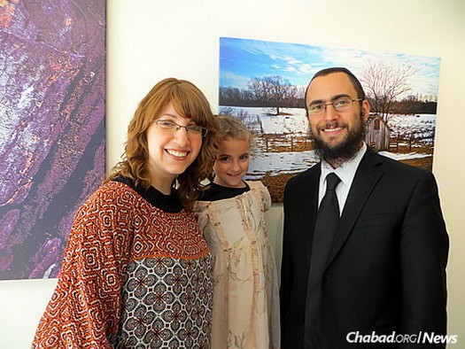 The Grodnitzkys, the parents of five children, with their older daughter, Tzippy.