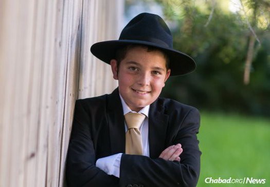 Mendel Cotlar, smiling on his bar mitzvah day, passed away just a few weeks later from the metabolic disease GSD. (Photo: Levikfoto)