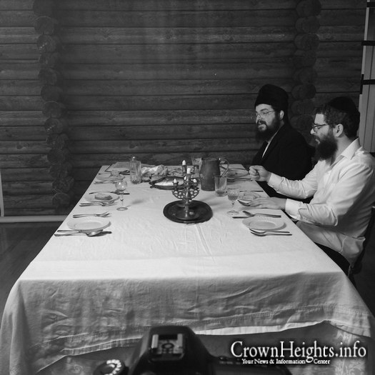 Benny Friedman (far) with Chaim Hershkowitz filmingon set.