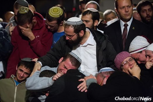 Hundreds gathered at the the funeral of Rabbi Yaakov Litman and his son Netanel, who were murdered by terrorists while driving to the pre-wedding celebration. Less than two weeks later, Litman's daughter invited the Jewish world “to get up from the dust and rejoice with us.” 