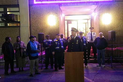 Captain Norman Grandstaff speaking at a vigil outside the 69th Precinct.
