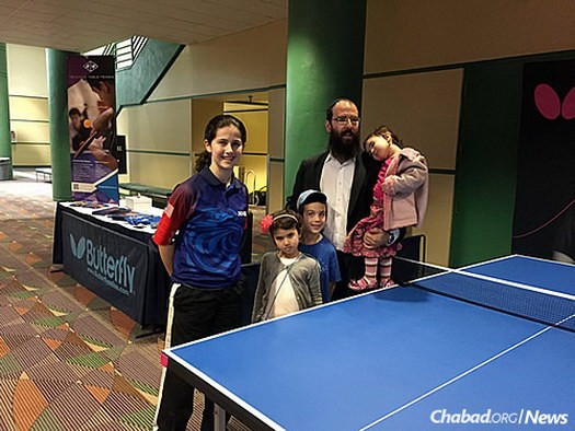 Estee with Rabbi Yosef Plotkin, co-director of Chabad-Lubavitch of Greensboro, N.C., and three of his four children who came to cheer her on. The Ackermans make a habit of eating and staying with Chabad families when Estee travels for competitions.