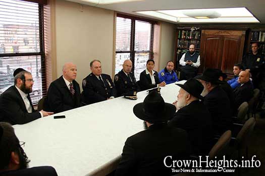 Inspector George Fitzgibbon at a meeting with Rabbi Yehuda Krinsky of Merkos Linyonei Chinuch.