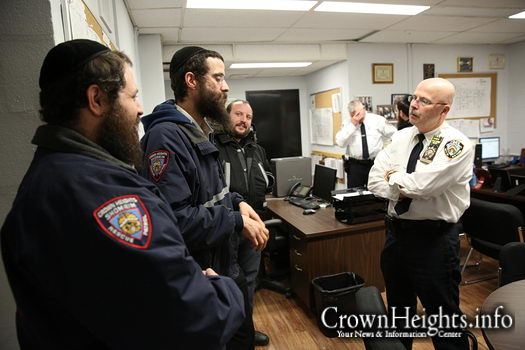Inspector George Fitzgibbon meeting with Shomrim volunteers and discussing the safety and security of Crown heights.