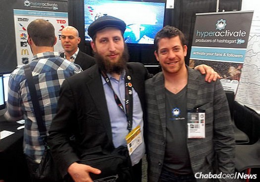 Lightstone with a startup entrepreneur from Tel Aviv on the SXSW showroom floor in a prior year.