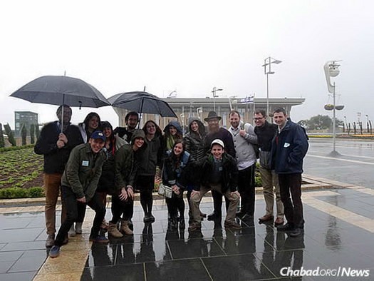 The student board of Chabad at Princeton University, led by Rabbi Eitan and Gitty Webb, spent a week in Israel, where they studied, spent time with wounded Israeli soldiers and met political officials. Here, they stand in front of the Knesset.