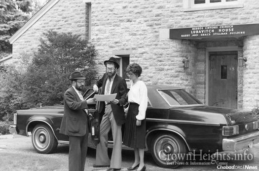Rabbi Moshe Feller, left, outside Lubavitch House at 15 Montcalm Court, where Bais Chana—the world-renowned educational institute for women—was born.