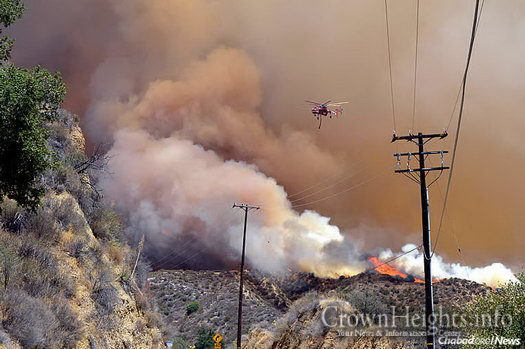 The “Sand Fire” on Monday, four days into the blaze that has claimed at least one life, destroyed 18 homes so far and burned more than 38,000 acres in the Santa Clarita Valley mountains. (Photo: InciWeb)