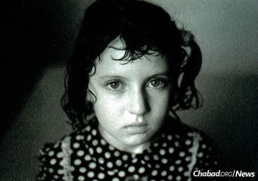 A little girl rescued by Children of Chernobyl.