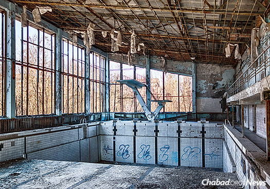 he 1,000-square-mile Chernobyl Exclusion Zone that surrounds the reactor is slowly being reclaimed by nature. It has also become a popular, if slightly dangerous, extreme tourism destination. Here, an abandoned swimming pool in Pripyat.