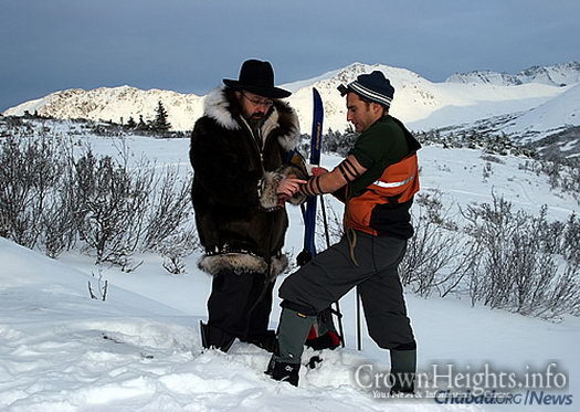 Rabbi Yosef Greenberg, co-director of the Lubavitch Jewish Center of Alaska, often wraps tefillin with Jewish residents and visitors alike.