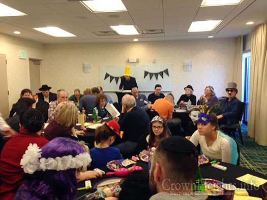 Rabbi Mendel Alperowitz reading the Megillah for some 45 people this past Purim in South Dakota.